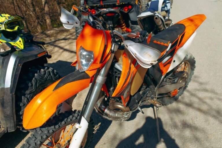 Orange off-road motorcycle ready for wrecking in Brisbane
